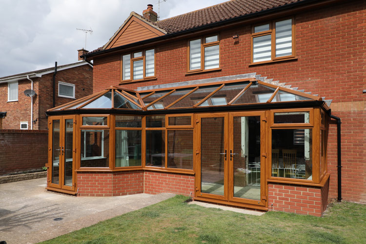 Light Oak on White PVCu P Shape Combination Conservatory with Solar Control self cleaning glass roof sheets & 2 sets of French doors