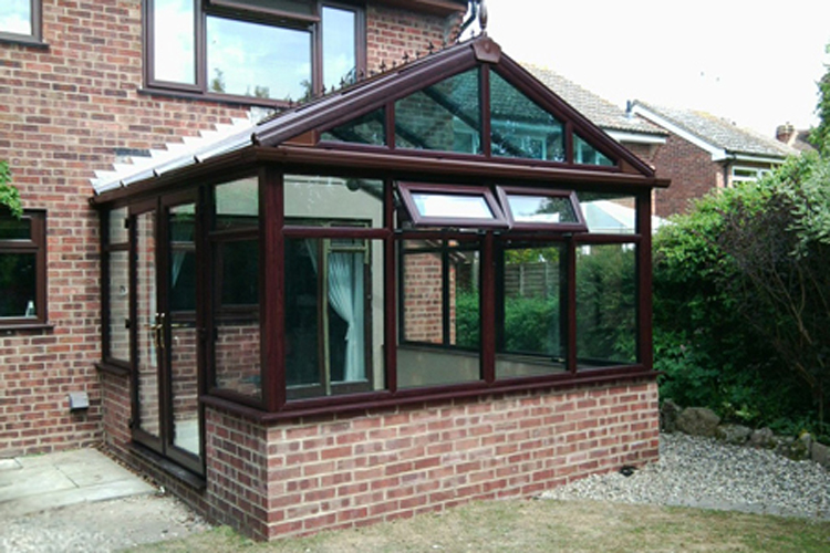 Rose wood PVCu Georgian Gable Conservatory with Solar control self cleaning roof & Rose wood PVCu French doors