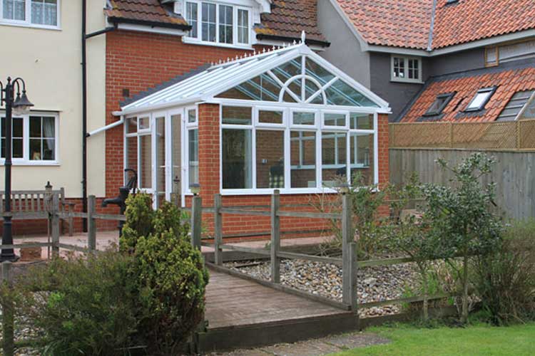 White PVCu Georgian Gable Conservatory with Solar control self cleaning roof & French doors