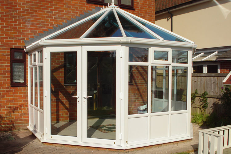 White PVCu Victorian Conservatory, solar control glass roof with white insulating base panels