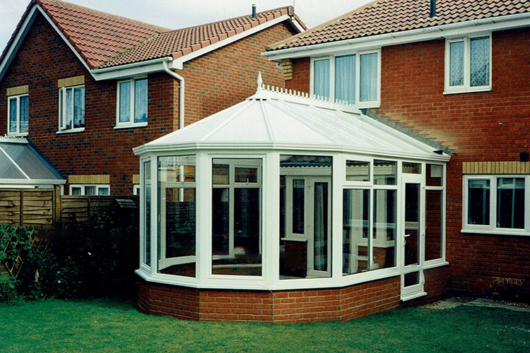 White PVCu 5 bay Victorian Conservatory, glass roof and tilt/turn windows