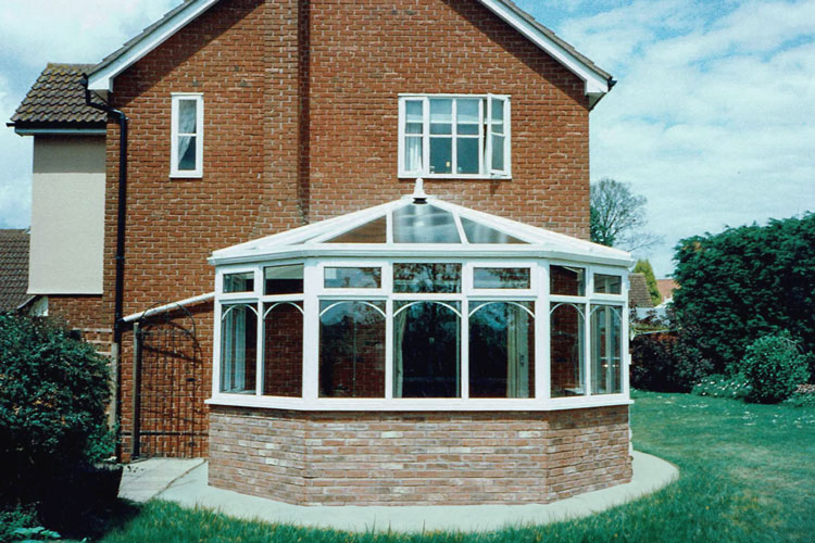 Unequal 3 bay white PVCu Victorian Conservatory